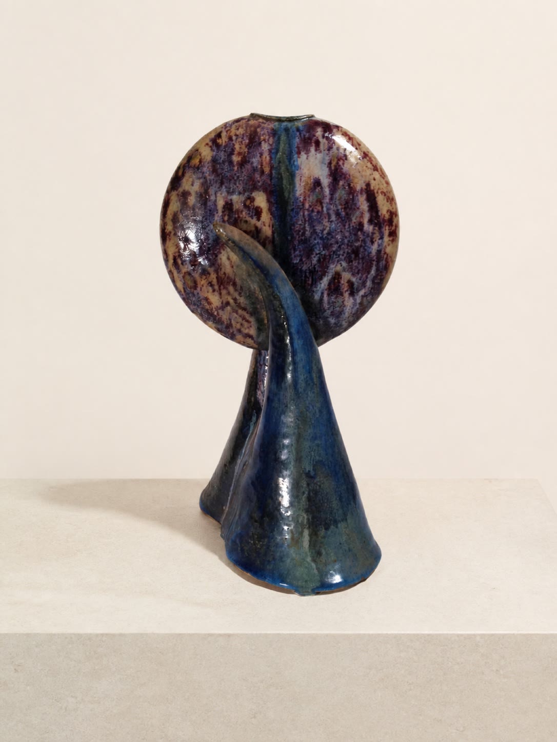 An abstract blue and purple ceramic tree-like form